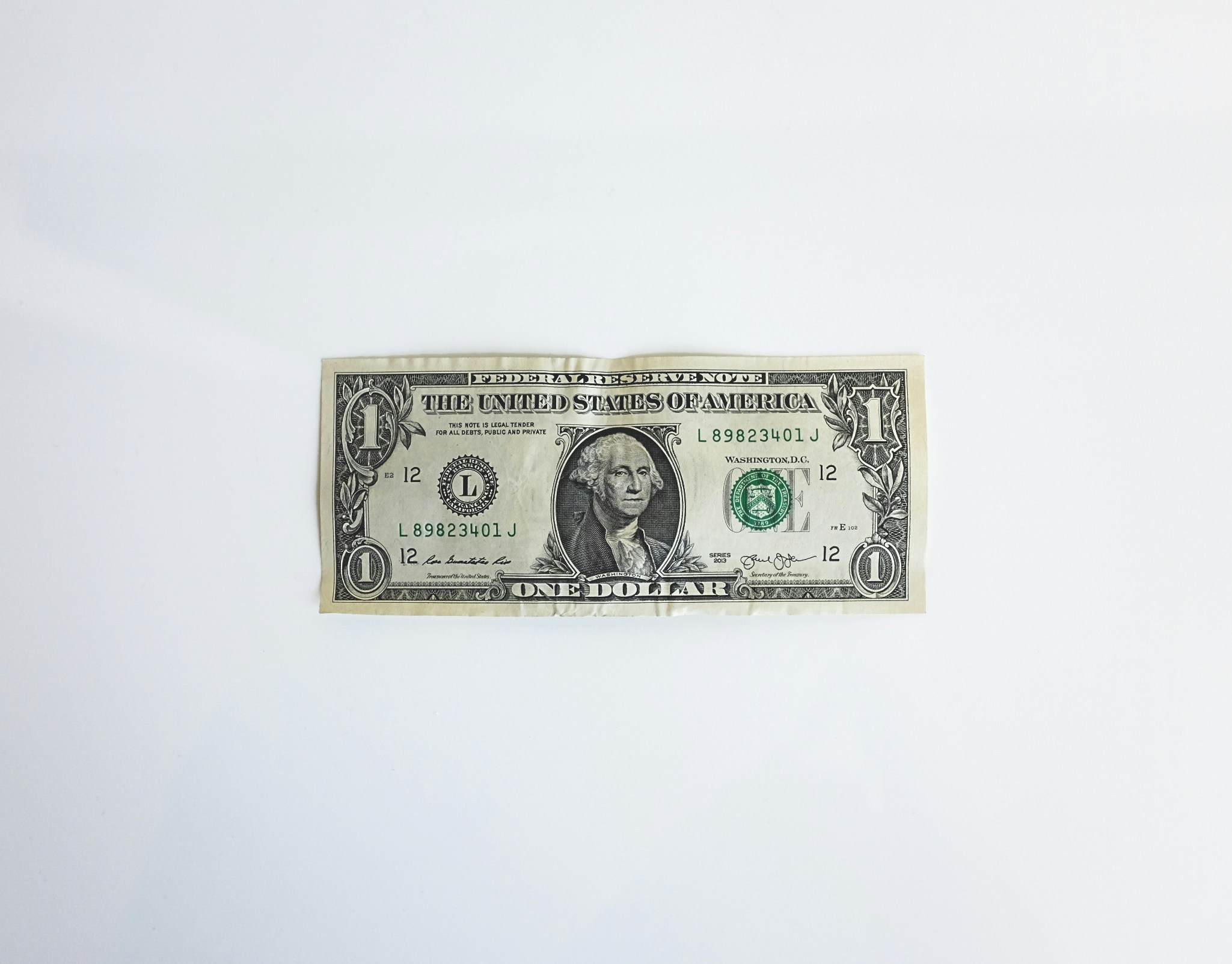 U.S. one dollar bill with George Washington's portrait and green seal