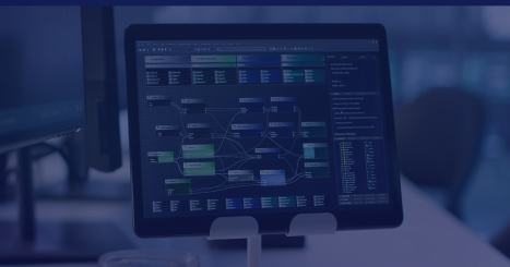 Code running on computer screens and tablets in an empty data center